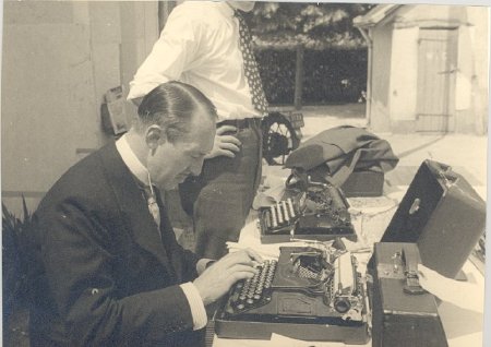 Webb Miller at typewriter