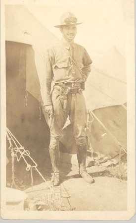 Wallace Smith in front of tent