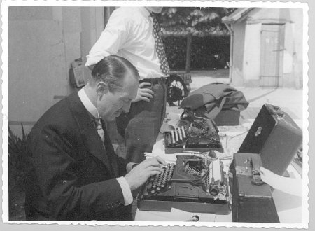 Webb Miller at typewriter