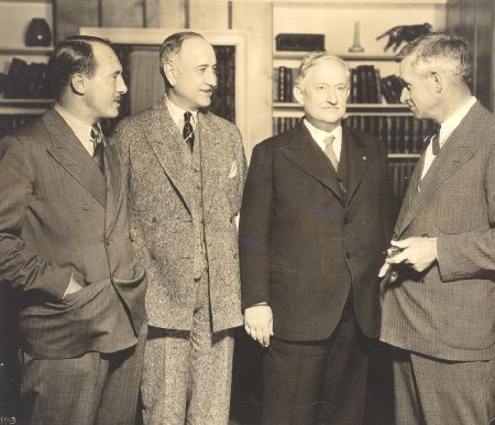 four men in office
