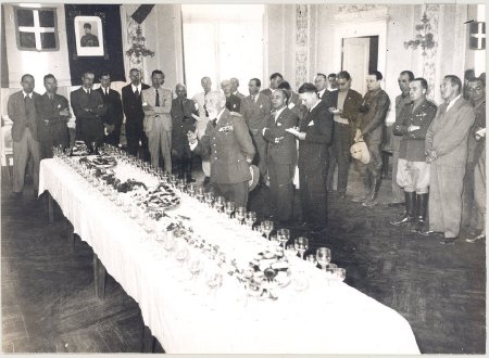 men standing by long table