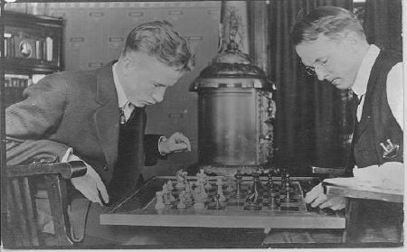 2  men chess in front of R. O.
