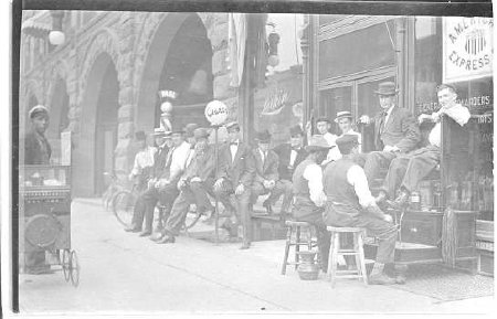 Several men sitting on benches